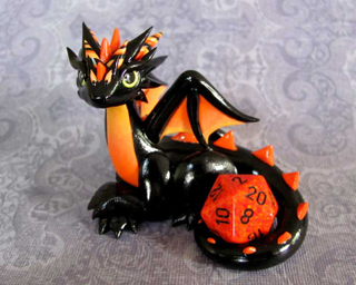 Illustration for article titled Adorable sculpted dragons guard your 20-sided dice